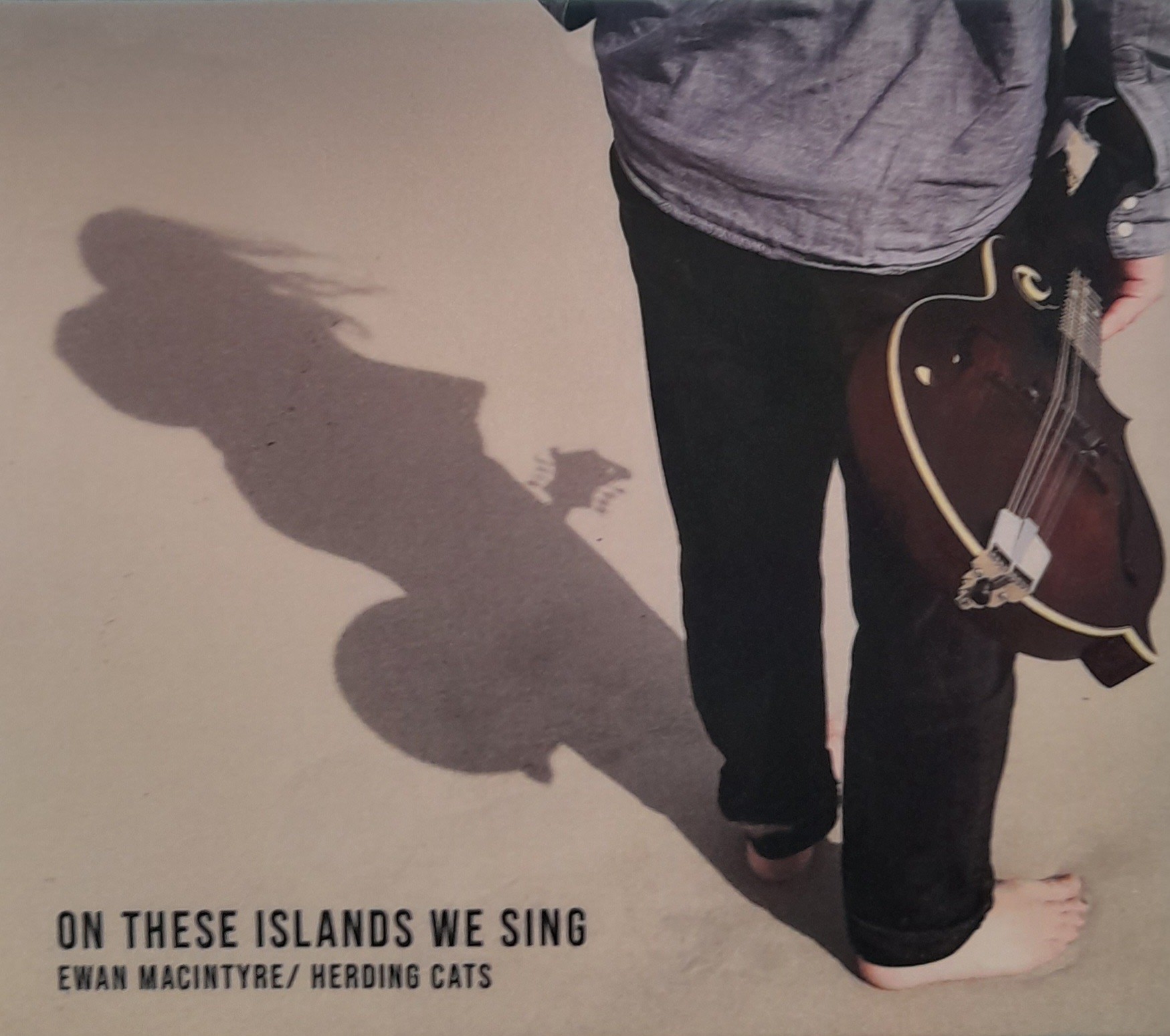 EWAN MACINTYRE HERDING CATS ON THESE ISLANDS WE SING EWAN MACINTYRE HERDING CATS ON THESE ISLANDS WE SING
